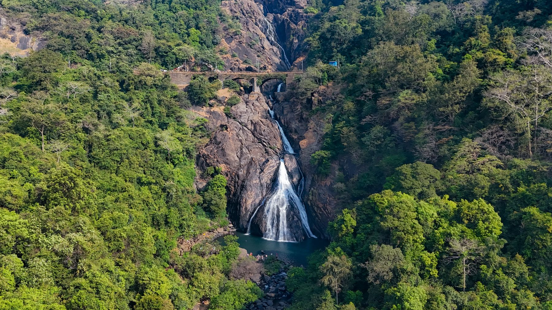 Aerial Waterfall In Forest Gorge